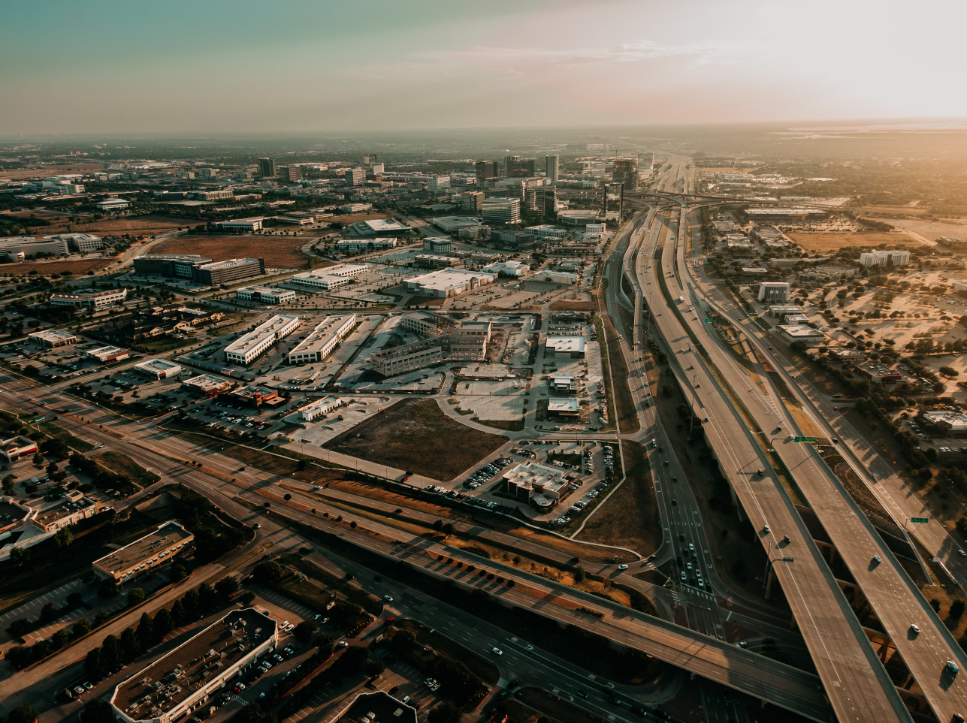 Aerial view of a lower middle market business corridor at sunset